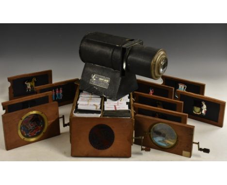 A collection of magic lantern slides, various types and subjects, including: mechanical kaleidoscopes by M G Hughes, Optician