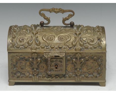 A late 19th century gilt brass table casket, cast in relief with flowers, scrolls and whiplash stems in a fin de siecle hybri