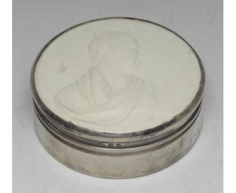 A George V silver circular box, the domed cover now set with a plaster cameo impression of Sir Walter Scott, 10cm diam, Adie 