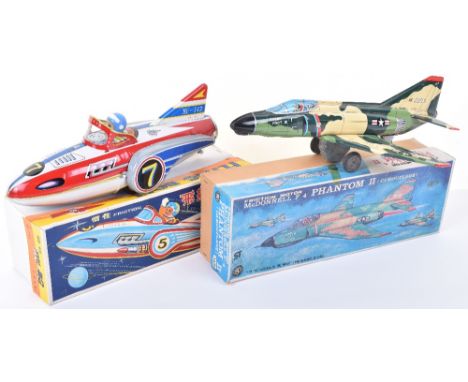 Boxed Masudaya friction driven McDonnell F-4 Phantom II, 1970s, camouflage finish, 36cm (14”) long, good condition, box good,