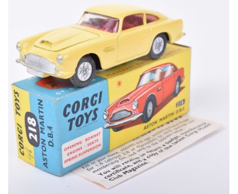 Corgi Toys 218 Aston Martin DB4, yellow body, red interior, cast wheel hubs, in near mint original condition, blue/yellow box