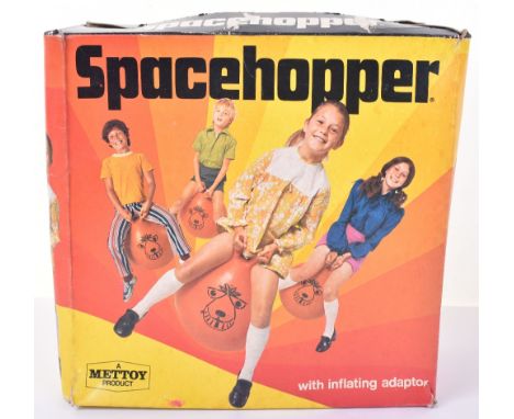 A Mettoy W005 Product Spacehopper, orange Inflatable vinyl  spacehopper toy, with horns and face, circa 1972, in mint unused 