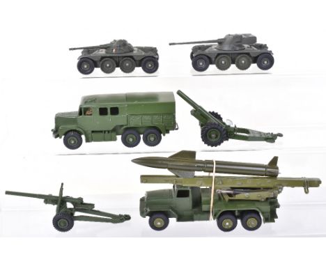 Six Unboxed Military Dinky Toys, 692 5.5 medium gun, 693 7.2 Howitzer, 689 Medium Artillery Tractor, 665 Honest John Missile 