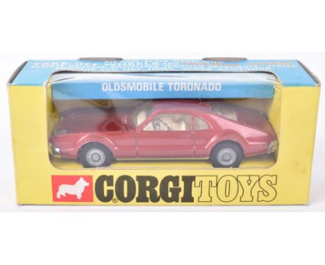 Corgi Toys 276 Oldsmobile Tornado ‘Golden Jacks’ take off wheels, metallic red body, cream interior, in very good to excellen