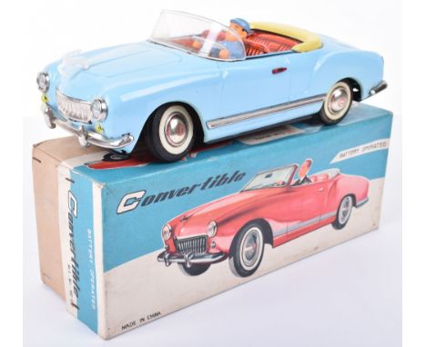 Boxed Chinese tinplate battery operated ME 612 Convertible, 1960s, light blue with red lithographed interior and rubber drive