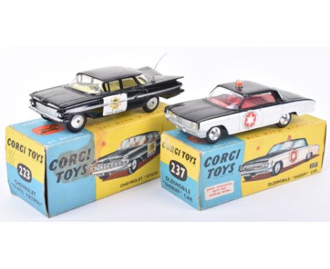 Corgi Toys  two boxed American Police cars, 237 Oldsmobile Sheriff’s car, black/white with County Sheriff door stickers, gene