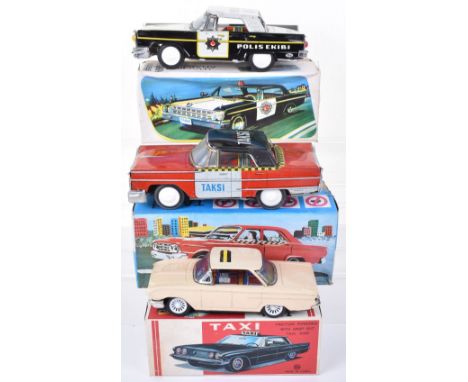 Three boxed tinplate cars, circa 1970, two Turkish clockwork cars, Taksi, finished in red and black with lithographed interio
