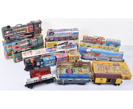Seven boxed friction driven and wind-up tinplate trains, 1960s/70s, Japanese Red Arrow steam train, 29cm (11 ½”) long, Daiya 