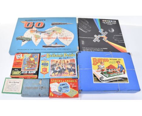 Collection of board games, puzzles and more, including Alice in Wonderland dexterity puzzle, two Victory wood jig-saws Athlon