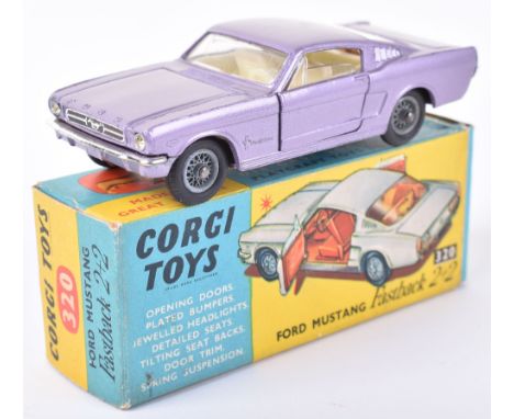 Corgi Toys 320 Ford Mustang Fastback 2+2 metallic purple, white interior, wire wheel hubs, in excellent original condition, v