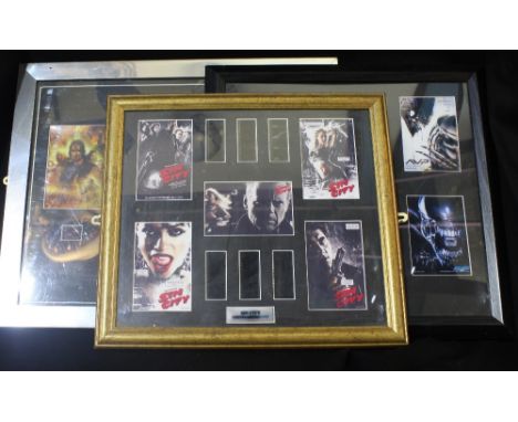 A collection of film cells including The Lord of the Rings, Sin City, Alien vs Predator, The Life of Brian, Die Hard 2 and 3,