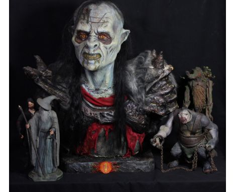 THE LORD OF THE RINGS; a large rubber over foam bust of a goblin, height including base approx 66cm, and four figures compris