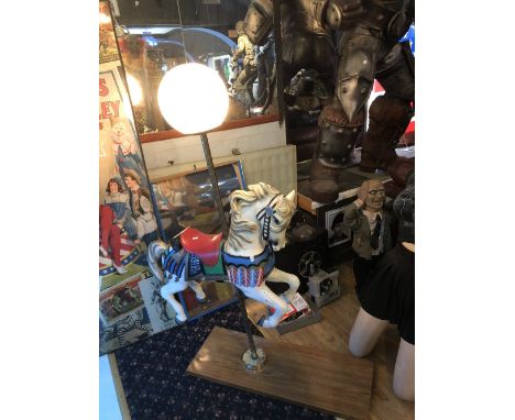 A small carousel horse now fitted as a lamp, height approx 150cm.