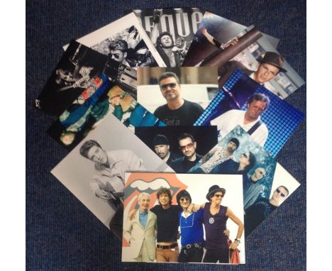 Music UNSIGNED photo collection.   22 photos mainly 10x8 size.   Includes George Michael, The Who, Michael Jackson, Eric Clap