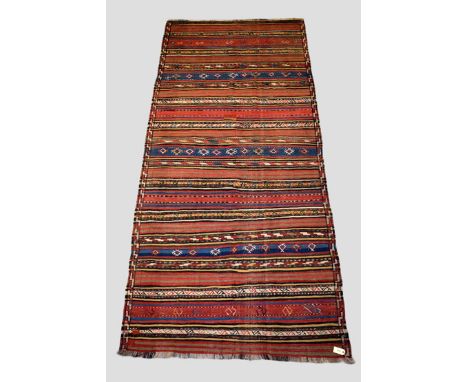 Khorasan banded and brocaded flatweave, north east Persia, first half 20th century, 10ft. 9in. x 4ft. 10in. 3.28m. x 1.47m. P