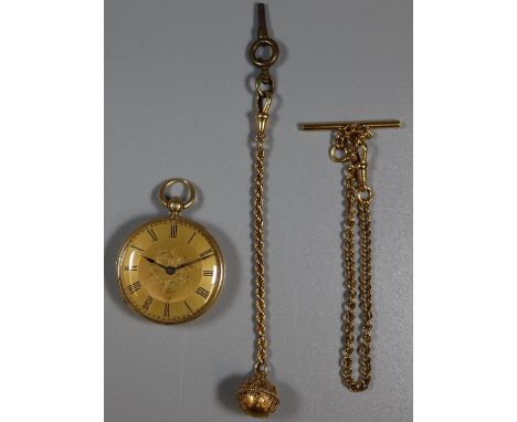18ct gold fancy key wind fob watch having engine turned Roman face and foliate engraved back. Together with a gold plated cur