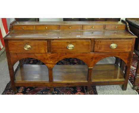 19th Century Welsh oak and other mixed woods dresser base having a row of five spice drawers to the top, with moulded edge ab