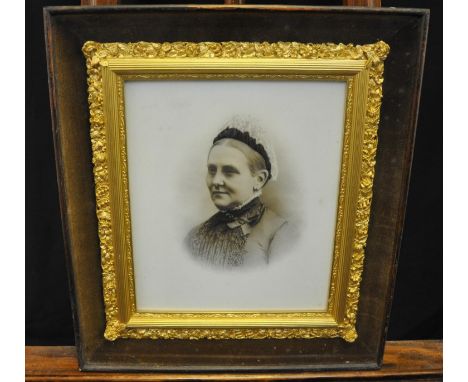 Early 20th Century photographic portrait study of a lady, probably on white glass or porcelain, in enclosed glazed frame with