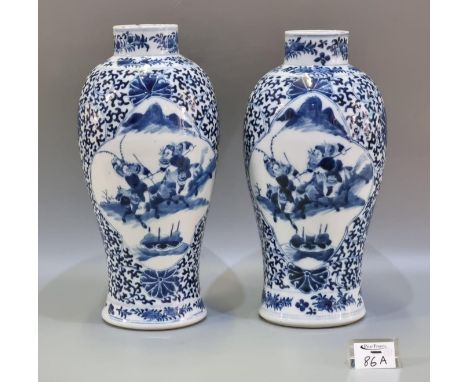 Pair of Chinese porcelain Late Qing 'mirror matched' blue and white baluster shaped vases painted with panels of warriors on 