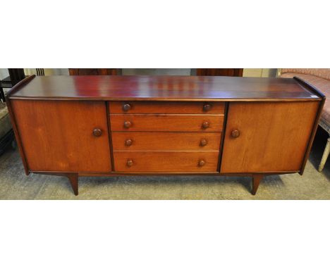 G Plan style teak sideboard, the bow front top flanked by two blind panelled doors and four graduated drawers to the centre, 