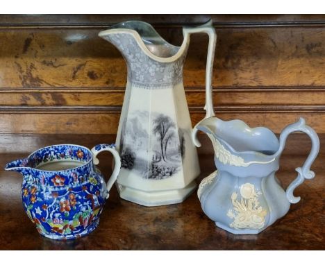 Three Welsh pottery jugs to include; Llanelly pottery 'Milan' pattern octagonal jug impressed 'South Wales Pottery', 30cm hig