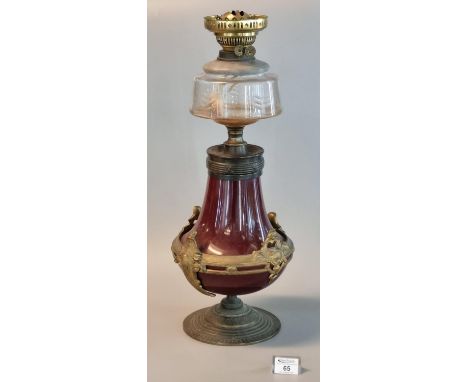 19th Century brass double burner oil lamp with cut glass reservoir on a ceramic vase shaped base with yellow metal mounts and