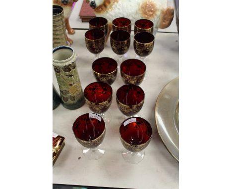 12 gilt decorated ruby glasses