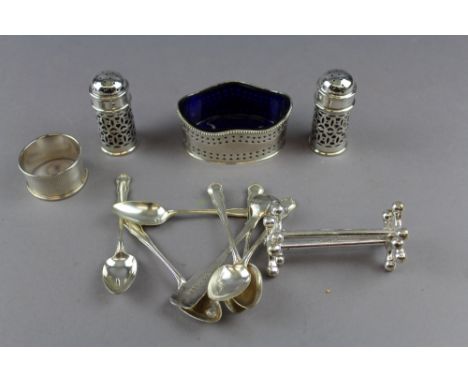 Three silver condiments, Birmingham, 1910 and napkin ring