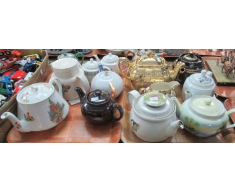 Two trays of mostly teapots to include: two Japanese teapots, one a red and gilt  teapot decorated with figures and marked to