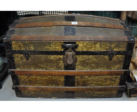 Late 19th/early 20th Century wooden and metal banded dome top trunk.(B.P. 21% + VAT) 