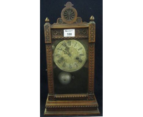 Early 20th Century German two train mahogany cased clock with chip carved architectural design decoration.(B.P. 21% + VAT) 