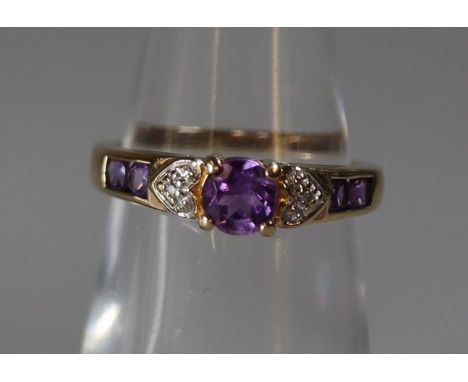 9ct gold amethyst and diamond dress ring.  Ring size K.  Weight approx 2.1 grams.(B.P. 21% + VAT) 