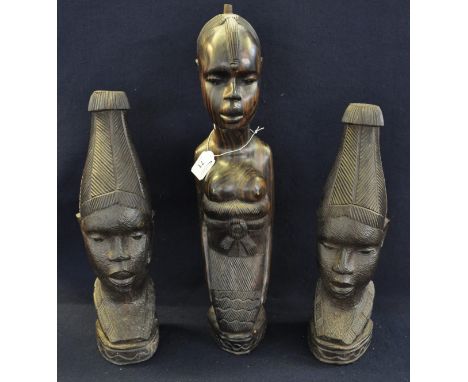 Pair of Nigerian carved tribal hardwood lamp bases in the form of bust figures of women with head dress and another figure of