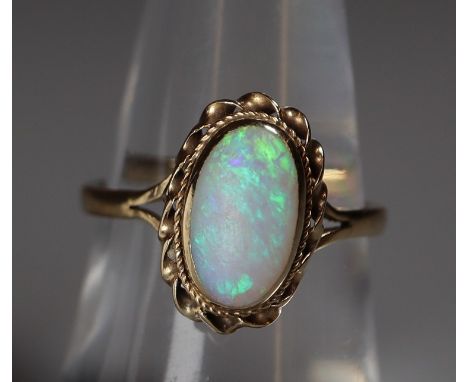 9ct gold and opal ring.  Ring size O&1/2.  Weight approx 2.3 grams.(B.P. 21% + VAT) 