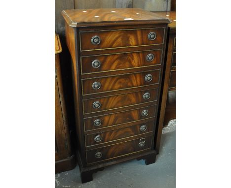 Regency style reproduction mahogany tall music filing cabinet with fall front drawers on bracket feet. 46cm wide approx.(B.P.