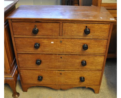 19th Century mahogany straight front chest of two short and three long drawers with turned ebonised handles on a shaped front
