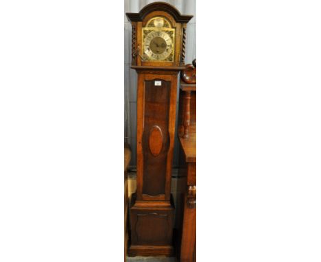 Early 20th Century oak three train Grandmother clock with brass face, having silvered Roman dial. (B.P. 21% + VAT) 
