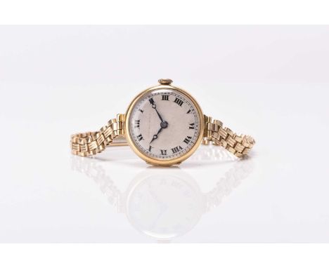 Tavannes Watch Co: A lady's 18ct gold wristwatchDate: Circa 1924Movement: 15-jewel manual windDial: Silver, black Roman hour 