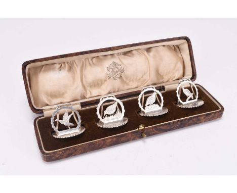 A cased set of four silver menu/place holders, Henry Pidduck &amp; Sons, Chester 1934-1937, each depicting a game bird, total