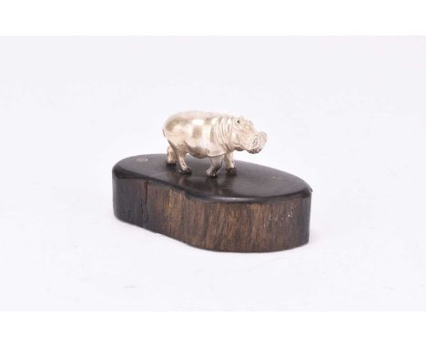 A Patrick Mavros silver model of a hippopotamus, presented upon wood base, 3.5cm high