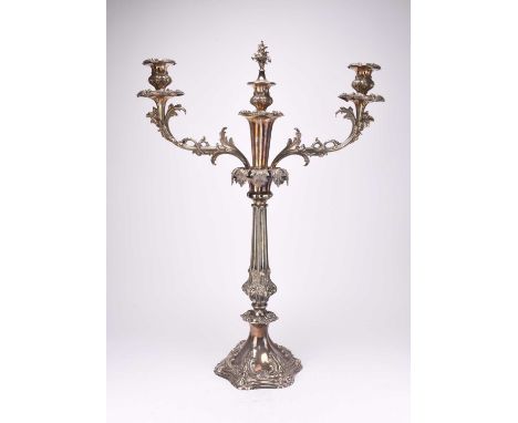 A Victorian large silver plated two branch candelabra, with acanthus leaf decoration and raised on spreading lobed base, the 