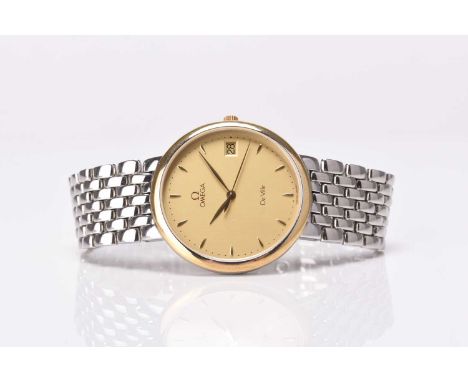 Omega: A gentleman's stainless steel and gilt bracelet watchModel: De VilleReference: 7227.1100 / 196.2432Date: 2002Movement: