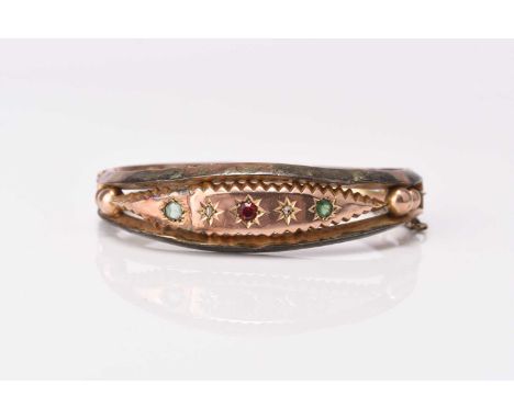 A diamond and paste set hinged bangle, the integral push clasp stamped '9', weight approx 12.3g