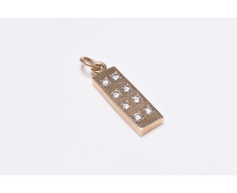 A 9ct gold diamond set ingot pendant, the rectangular yellow gold ingot set with eight round brilliant cut diamonds, with pen