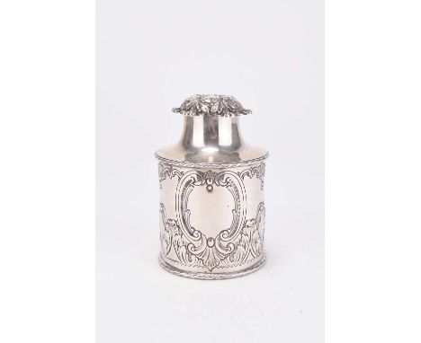 An Edwardian silver tea caddy, Williams Ltd, Birmingham 1902, of cylindrical form with embossed decoration, 10.5cm high, weig