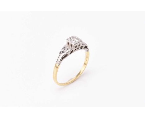 A single stone diamond ring, the brilliant cut diamond box set in white metal to yellow metal shank, stamped '18ct plat', siz