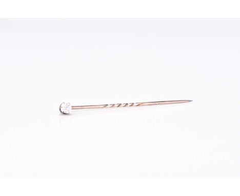 An old cut diamond set stick pin, mounted in yellow metal, weight approx 1.2gCondition:Diamond measures approx 4.4mm x 3.7mm 