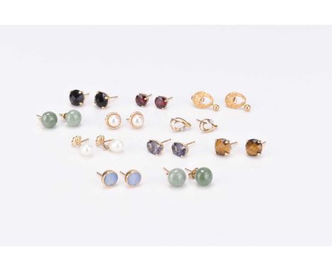 A collection of eleven pairs of 9ct gold and yellow metal mounted stud earrings, to include; Tigers eye, opal, cultured pearl