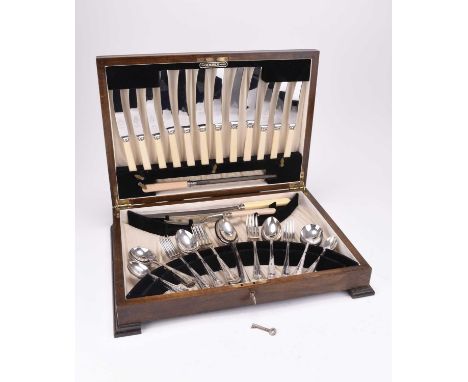 An Art Deco canteen of silver plated cutlery, the six place setting comprises; side knives, table knives, table forks, desser