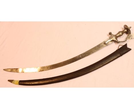 A 19th century Indian Tulwar sabre, with steel grip and dish form pommel and leather scabbard, blade L: 74 cm. P&amp;P Group 